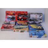 One box of mixed plastic kits all appear as issued to include military, and race car examples,