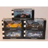 Five various boxed Minichamps 1/43 scale high speed racing race cars, all housed in original