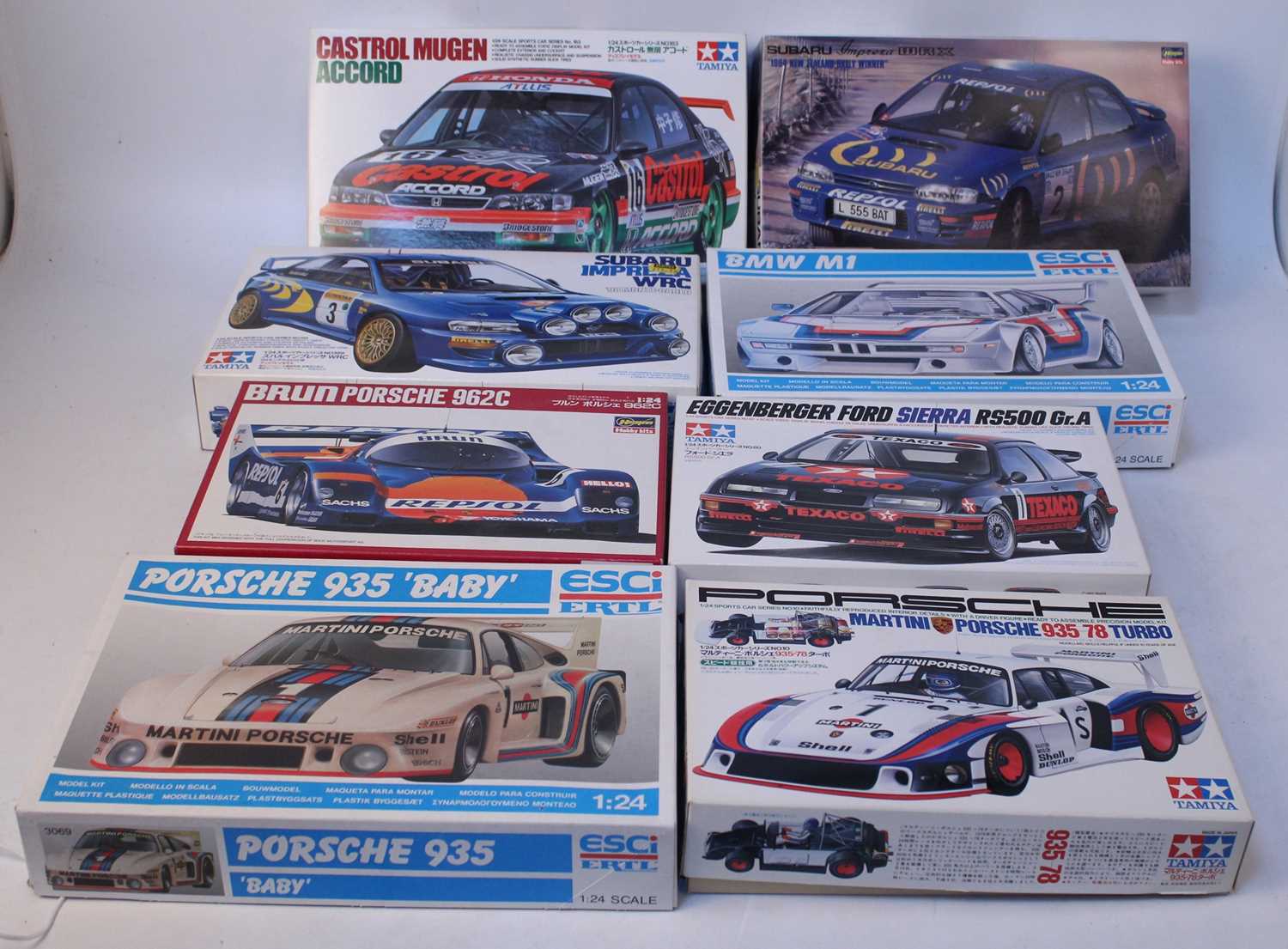 Eight various boxed Tamiya, Hasegawa and Esci 1.24 scale Classic Car and high speed racing kits to