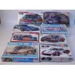 Eight various boxed Tamiya, Hasegawa and Esci 1.24 scale Classic Car and high speed racing kits to