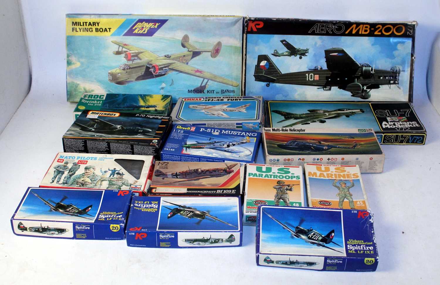 One box containing 21 various mixed scale plastic military aircraft and vehicle kits, mixed