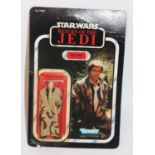 A Star Wars Return of the Jedi Kenner Han Solo in Trench Coat carded 3¾" action figure, housed on