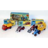 One box containing four boxed and slightly playworn Corgi Toy farming and commercial vehicles to