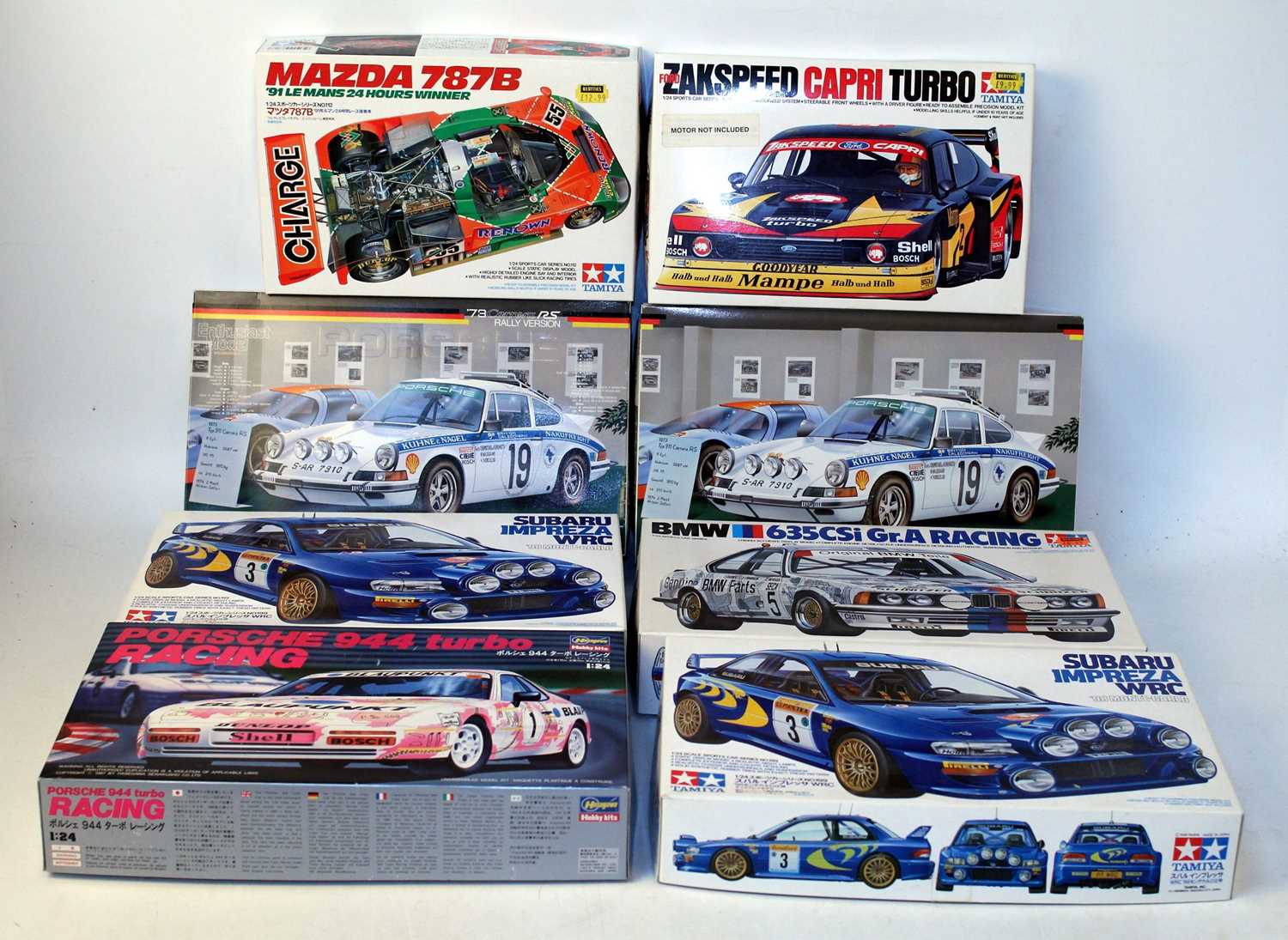 Eight various boxed Tamiya, Hasegawa, and Fujimi 1/24 scale mixed racing car and World Rally