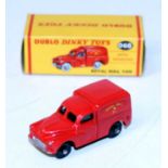 A Dublo Dinky Toys No. 068 Royal Mail van comprising red body with black plastic wheels housed in