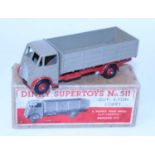 A Dinky Toys No. 511 guy 4-ton lorry comprising of fawn cab and back with red chassis and matching