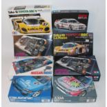 Eight various boxed 1/24 scale Tamiya, Hasegawa and Rosso high speed racing and sports car kits, all