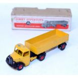 A Dinky Toys No. 521 Bedford articulated lorry comprising black and yellow body with red hubs,