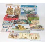 One tray containing 16 various mixed scale boxed plastic military kits to include Airfix, Tamiya,