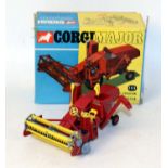 A Corgi Toys No. 1111 Massey Ferguson 780 combine comprising red body with red plastic hubs and