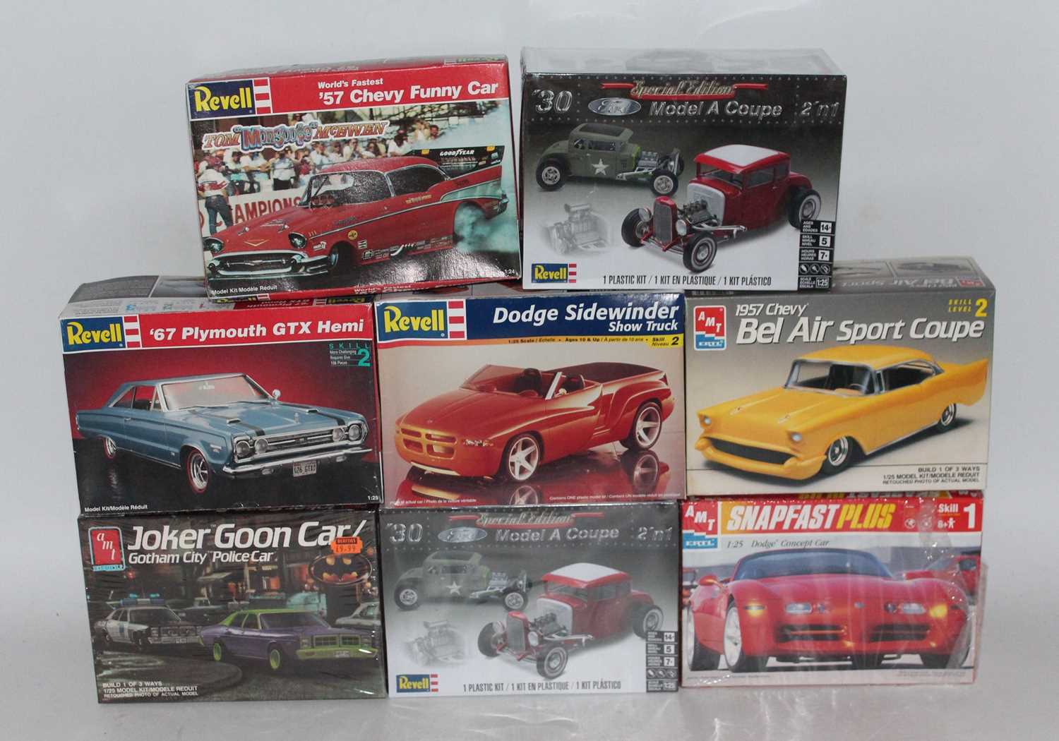 Eight various boxed Revell and AMT 1/25 scale plastic car kits to include Gotham City Jokers Goon