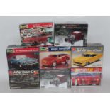 Eight various boxed Revell and AMT 1/25 scale plastic car kits to include Gotham City Jokers Goon