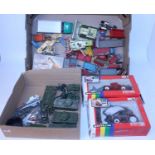 Two trays containing a quantity of various boxed and loose Dinky Toy, Matchbox, Britains and other