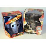 A boxed Dr Who radio controlled and voice changer group to include a character online cyber man
