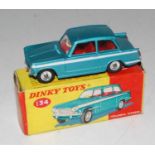 Dinky Toys, 134 Triumph Vitesse in aqua blue, red interior, one small blemish to roof, with complete