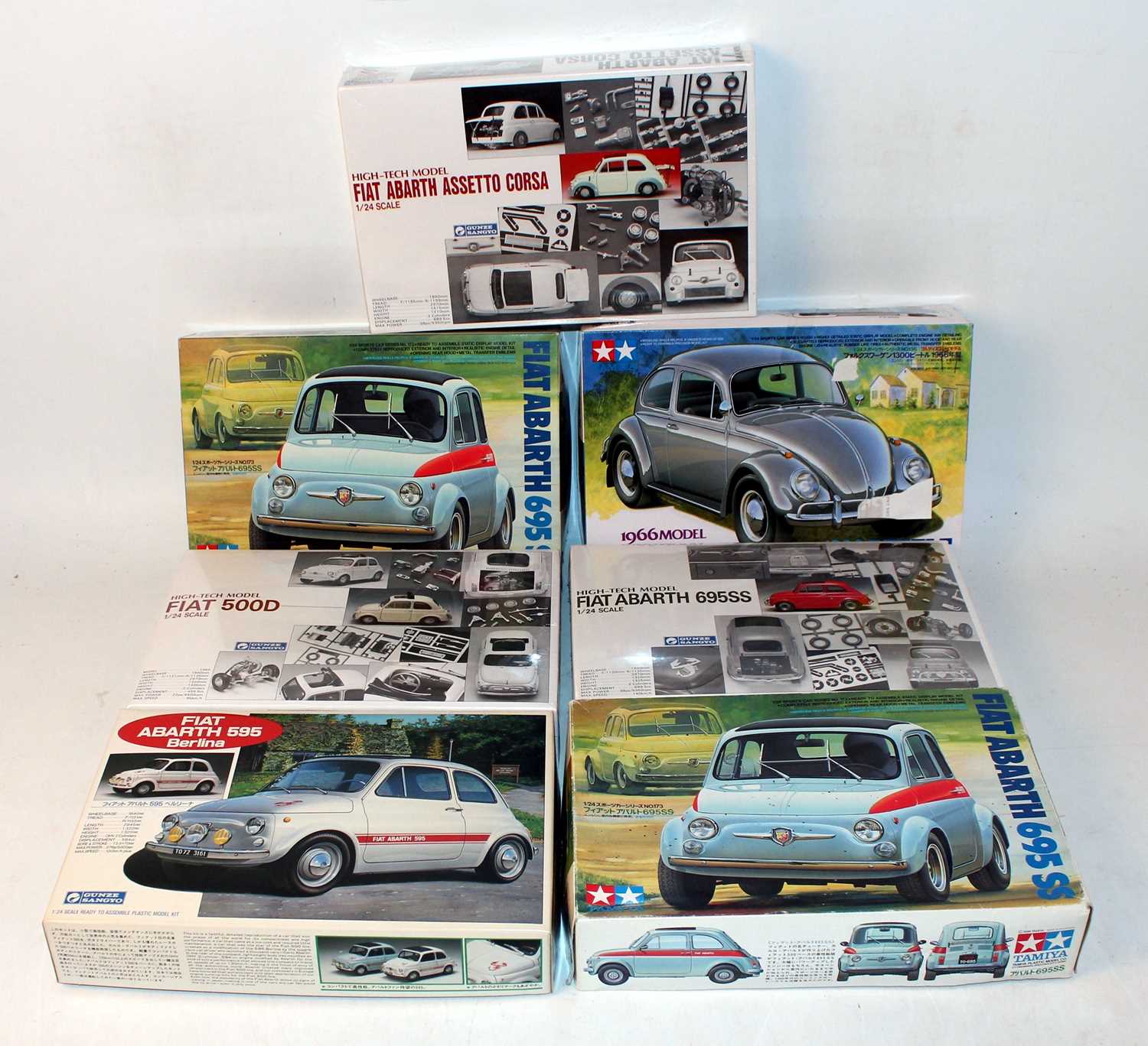 Seven various boxed Tamiya and Gunze Sangyo 1/24 scale plastic and white metal car kits to include a