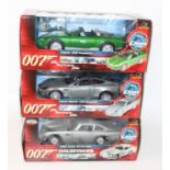 A James Bond 007 RC2 1/18 scale diecast group, three boxed as issued examples to include a Die