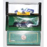 A 1/18 scale boxed diecast group, three boxed as issued examples to include a Corgi Toys 1/18