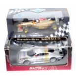 An Auto Art and Minichamps 1/18 scale race car group to include a Minichamps 18 model No. 960012 a