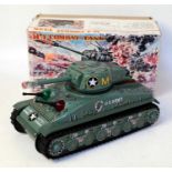 A Taiyo Toys of Japan tinplate and battery operated M4 combat tank, decorated in green with silver