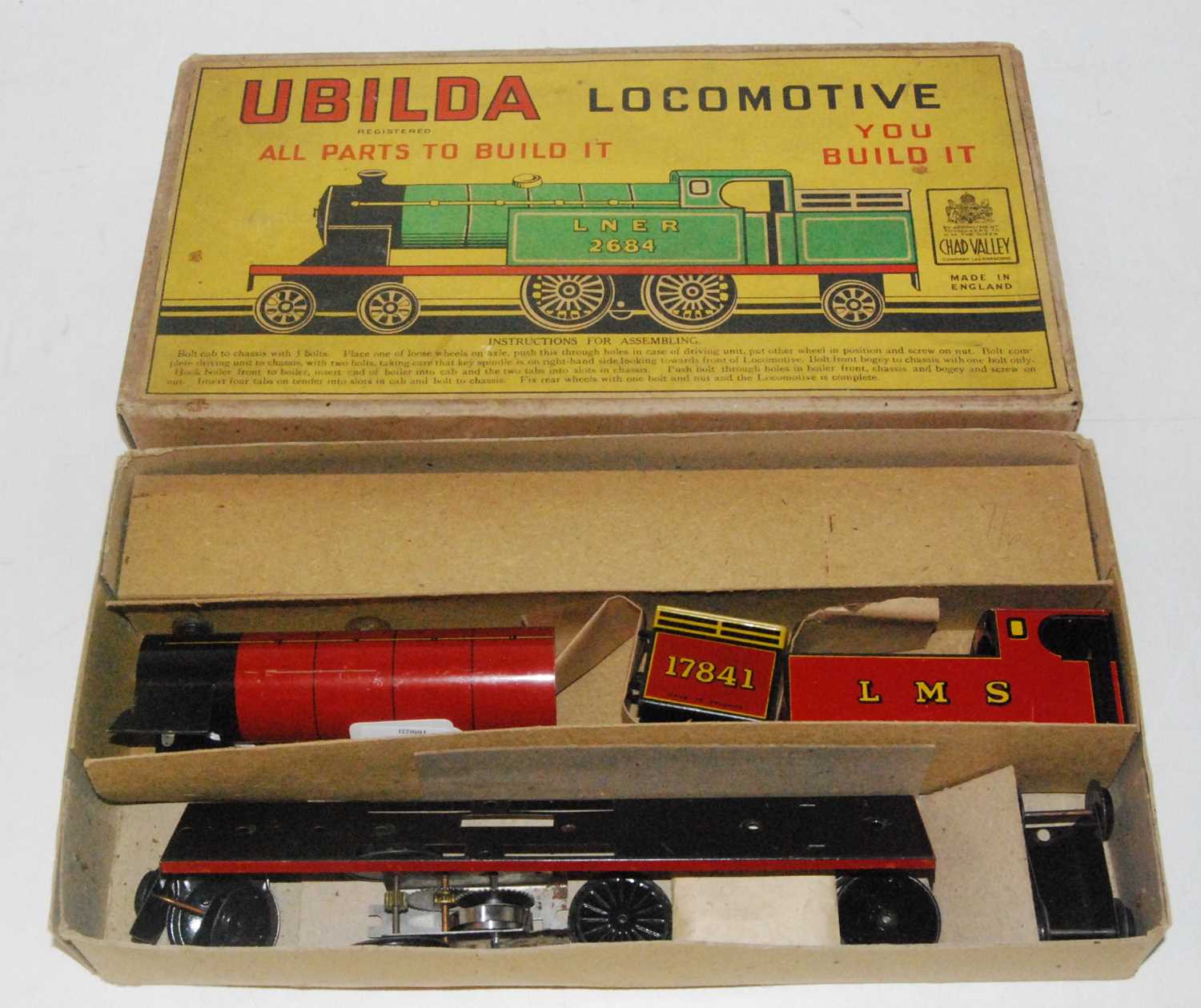 A Chad Valley Ubilda locomotive housed in the original labelled card box, appears complete with