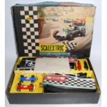 A Scalextric set No. 50 F1 Raceway playset, comprising of two cars, two throttles, various track,