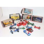 A collection of various boxed and loose Scalextric, and 1/24 scale diecast vehicles and