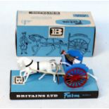 A Britains farm No. 9503 milk float comprising of white horse with blue and cream trailer fitted