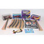 A collection of Scalextric Sport box sets, accessories, and boxed cars, mixed examples to include