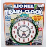 A Lionel 100th Anniversary train wall clock with railroad sound effects and train revolves round