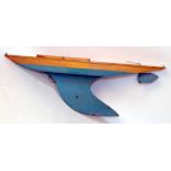 Bowman yacht hull without mast, with keel, with rudder, varnished above waterline, turquoise