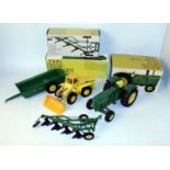 An ERTL and Gama John Deere tractor and Massey Ferguson large scale pressed steel group, to