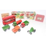 A Triang Minic boxed tinplate and clockwork vehicle group to include a Minic tractor and trailer,