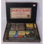 Meccano accessory outfit box No. 5A, early 1920s, containing a good quantity of contemporary parts