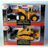 Two boxed as issued Newbright Radio Controlled construction vehicles to include a Newbright Power