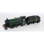 0-6-0 GWR loco and tender, very heavily painted green massive spring clockwork motor, possibly