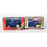 A Britains boxed tractor group to include a No. 9523 Ford TW 20 tractor and a No. 9524 Ford 6600