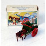 A Britains Liliput Series LV606 tumble cart comprising of green and red body, with brown hayracks