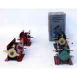 Four E20B Meccano electric motors late 1920s, early 1030s, 2x light red (E), one blue (A) boxed, one