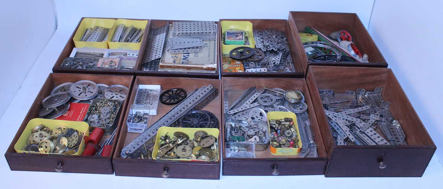 Multidrawer well-made wooden cabinet containing comprehensive collection nickel Meccano, overall (