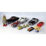 One tray containing a quantity of mixed issue tinplate vehicles and accessories to include a