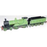 A whitemetal kit built T9 class 4-4-0 engine and 8 wheel tender finished in LSWR lined light green