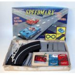 A Marx Toys battery operated Speed Marx auto racing set housed in the original picture card box (