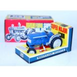 A Britains No. 9527 Ford Super Major 5000 tractor comprising of blue body with grey mudguards and