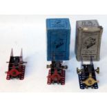 Three E6 Meccano electric motors: 2x light red 1933 (one boxed), both (E), one blue, boxed (E)