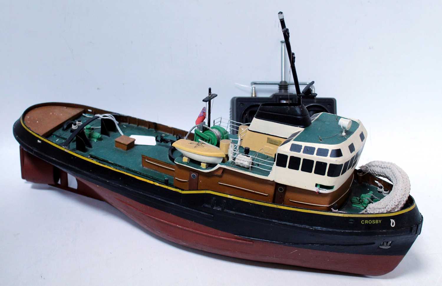 A wooden kit built, possibly Calder Craft, model of a Liverpool Crosby tug, finished in red and