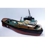 A wooden kit built, possibly Calder Craft, model of a Liverpool Crosby tug, finished in red and