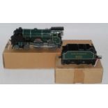 A completely repainted and restored Hornby clockwork 'Eton' engine and tender (GR)