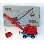 A Joustra Ref. No. 496 tinplate and clockwork model of a "Grue" wheeled crane, comprising of red