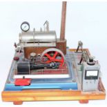Wilesco D24 steam plant housed on wooden plinth comprising of single horizontal boiler, with